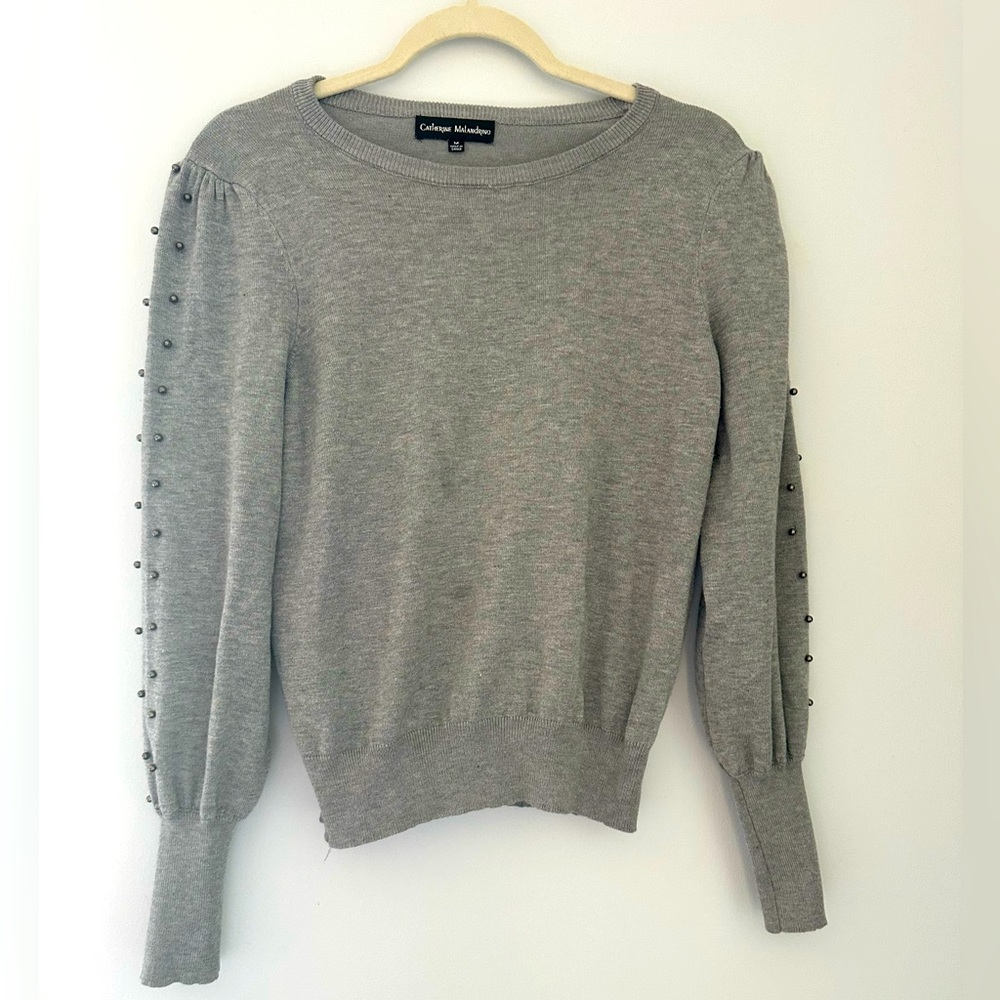 Grey crew neck sweater with studded detail on sleeves